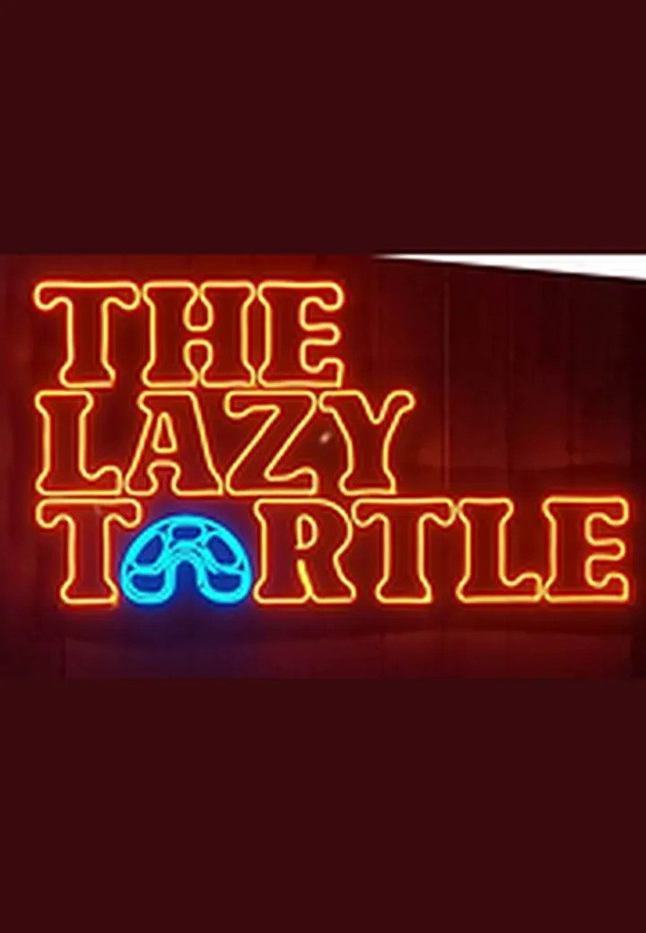 Bright red and blue LED neon sign reading The Lazy Turtle glowing against a dark wall